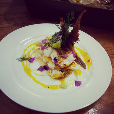 Baked Snapper with crispy wings and sexy Nigella and herb limes
