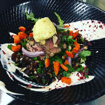 Moroccan inspired Suntanned pan-lamb with date, mint and pistachio bling
